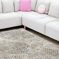 7x10 Sand & Light Blue Geometric Area Rug