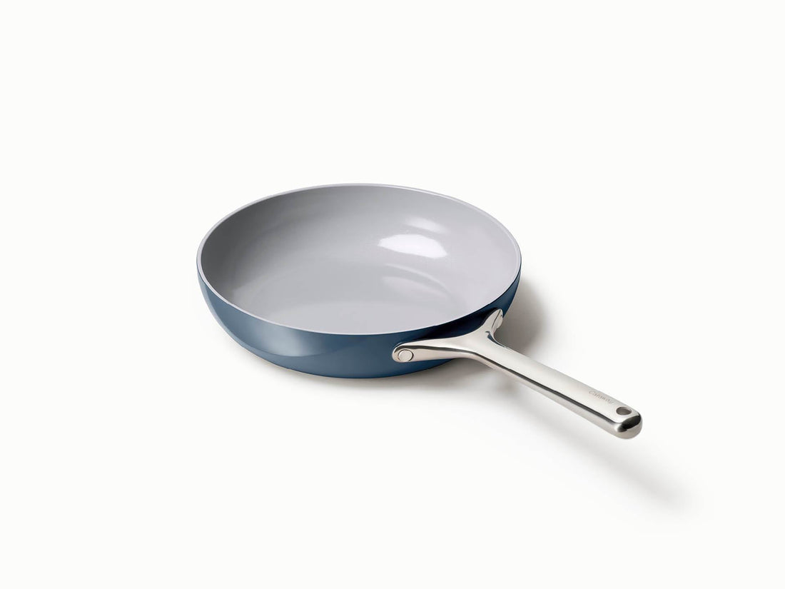 https://comebackgoods.com/cdn/shop/products/Caraway_FryPan1_Navy_6ae36e4c-1604-4476-8c41-317a2025ebc3_1100x.jpg?v=1669865143